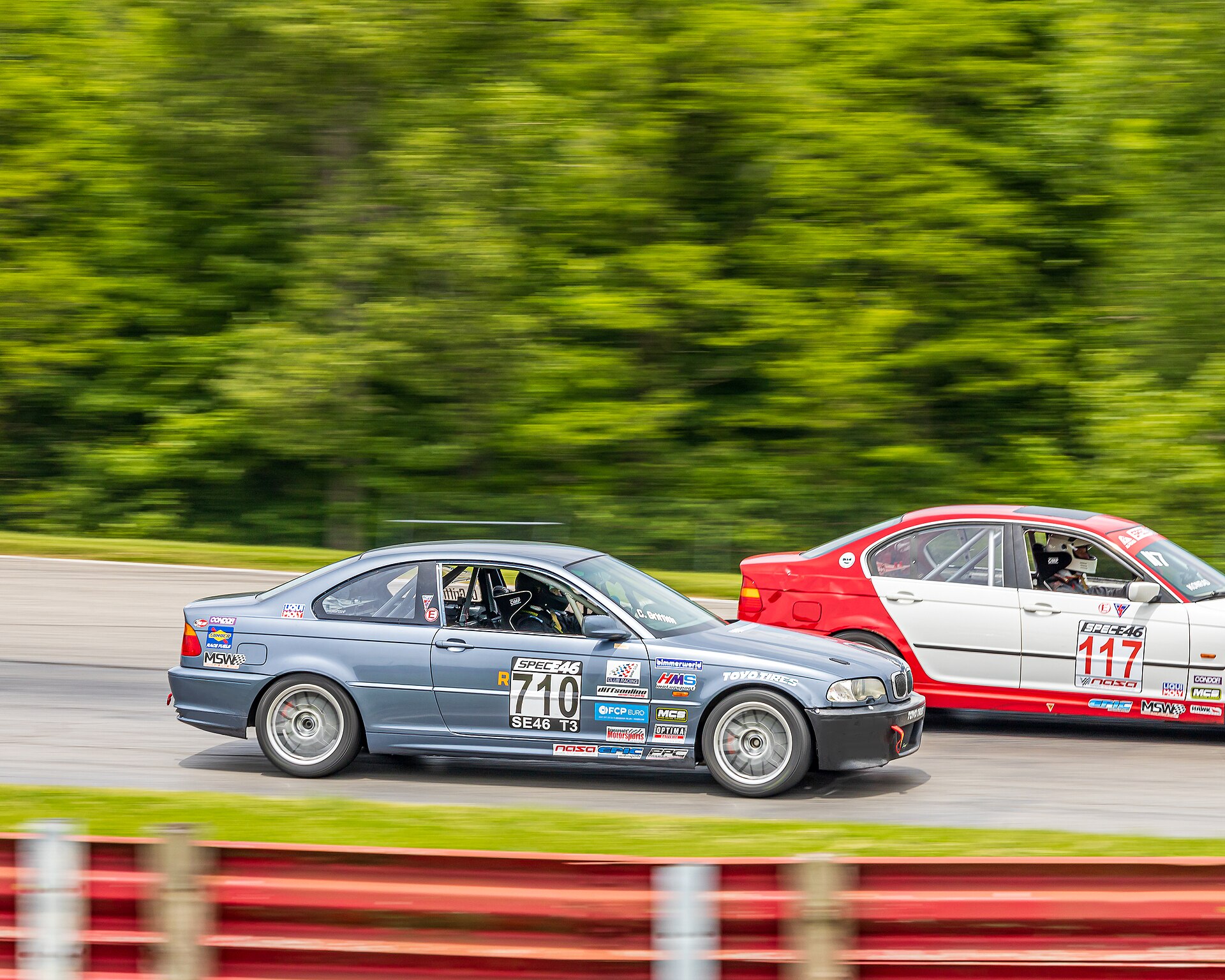 Two BMW Spec E46 race cars on track